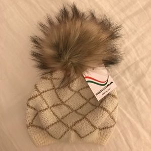 Beanie hat with faux fur puff